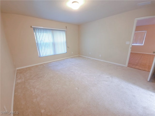 view of carpeted spare room