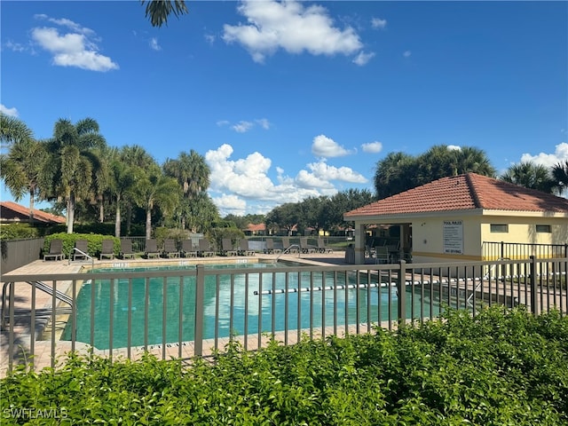 view of pool featuring a patio