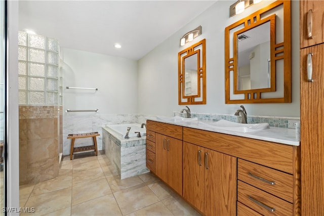 bathroom with vanity, plus walk in shower, and tile patterned floors