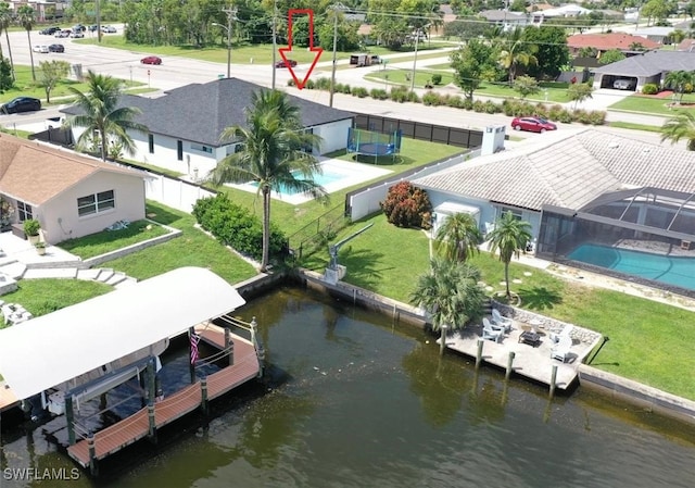 drone / aerial view featuring a water view