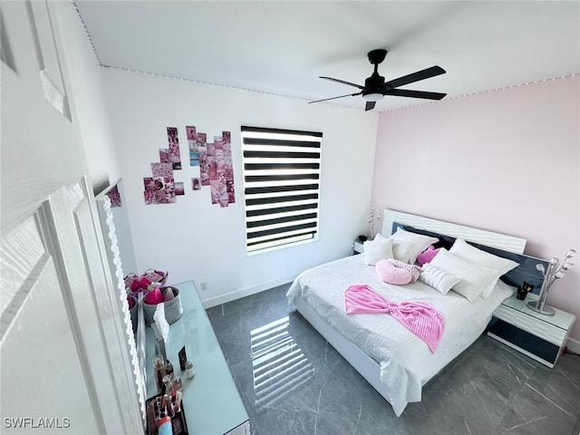 bedroom featuring ceiling fan