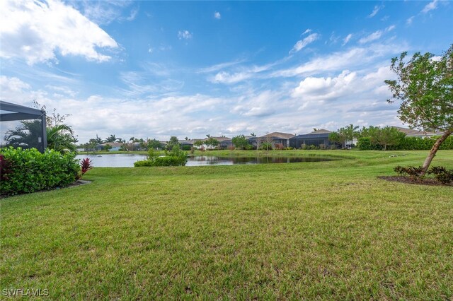 view of yard with a water view