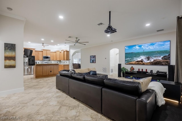 living room featuring crown molding and ceiling fan