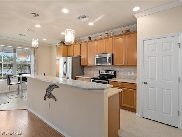 kitchen featuring brown cabinets, crown molding, visible vents, decorative backsplash, and appliances with stainless steel finishes