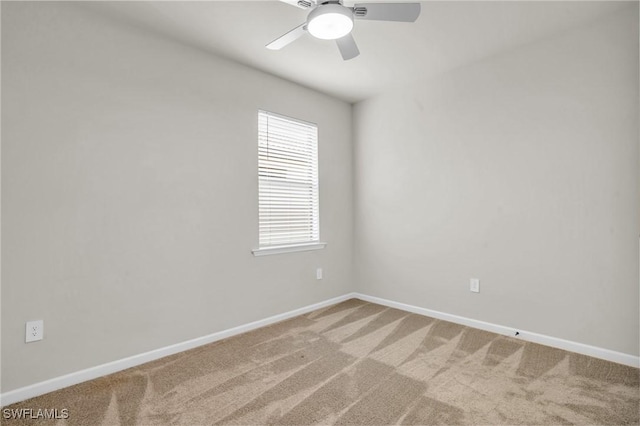 unfurnished room featuring carpet flooring and ceiling fan