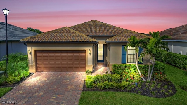 view of front of home featuring a garage