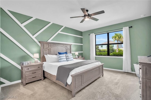 bedroom with light colored carpet and ceiling fan