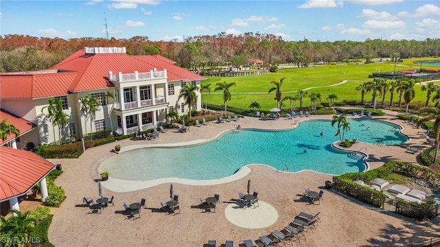 view of pool featuring a patio area