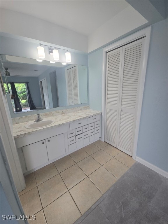 bathroom featuring vanity and tile patterned floors