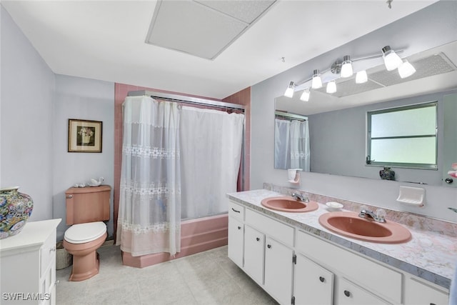 full bathroom featuring vanity, toilet, shower / bathtub combination with curtain, and tile patterned floors