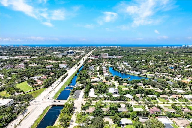 drone / aerial view with a water view