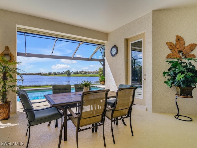 exterior space featuring a water view and a lanai