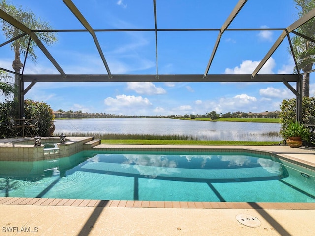 view of swimming pool featuring a lanai, a water view, and an in ground hot tub