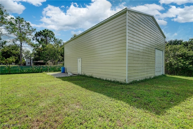 view of home's exterior with a lawn