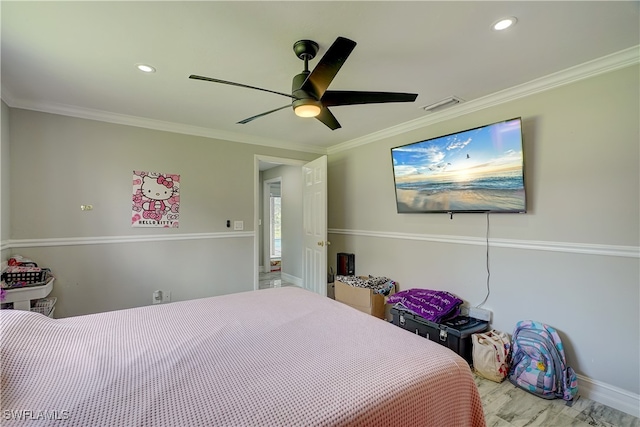 bedroom with ceiling fan and ornamental molding