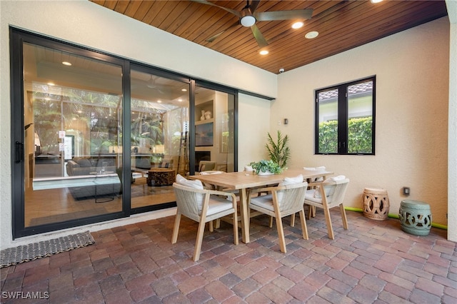 interior space featuring ceiling fan