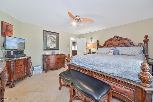 bedroom featuring ceiling fan and light tile patterned floors