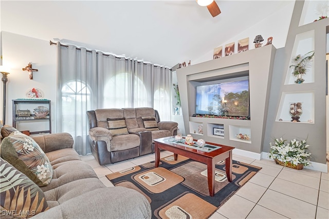 living room featuring light tile patterned floors, lofted ceiling, and ceiling fan