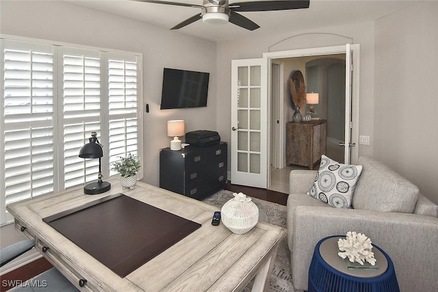 interior space featuring ceiling fan