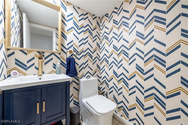 bathroom featuring curtained shower, vanity, and toilet