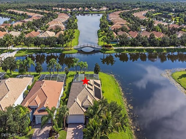 bird's eye view with a water view