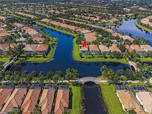 drone / aerial view featuring a water view