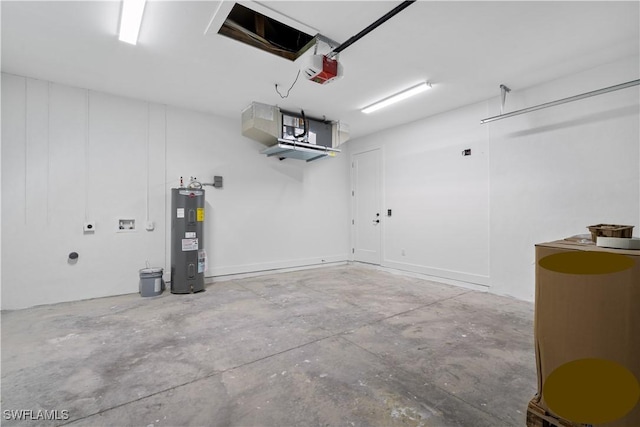 garage with electric water heater and a garage door opener