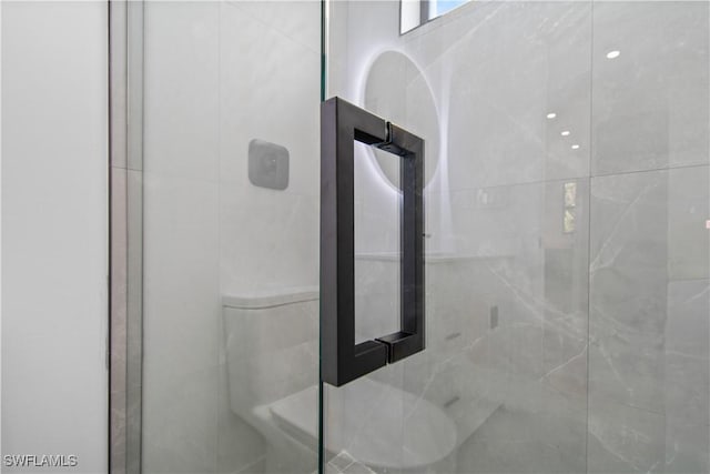 bathroom featuring walk in shower