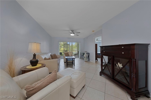 living room with ceiling fan and light tile patterned floors