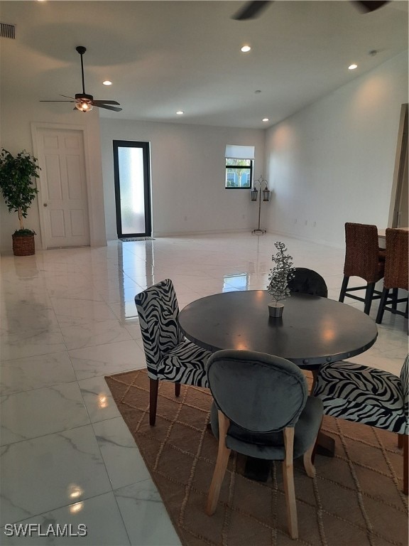 dining area with ceiling fan