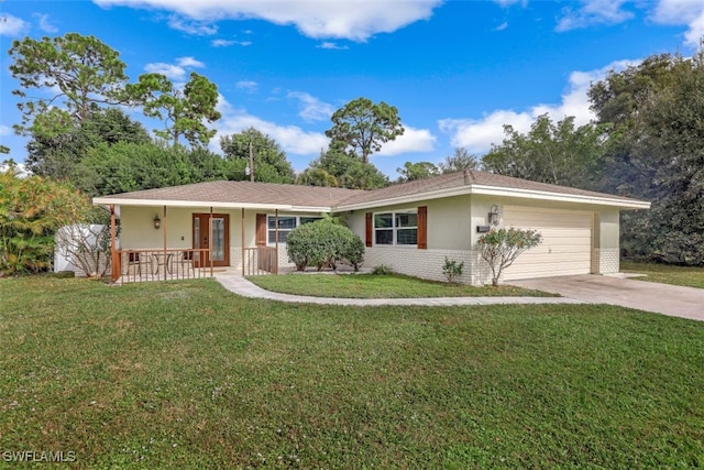 ranch-style home with a garage, a front lawn, and covered porch