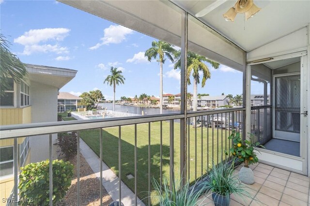 balcony featuring a water view