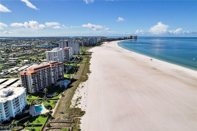 bird's eye view with a view of the beach and a water view