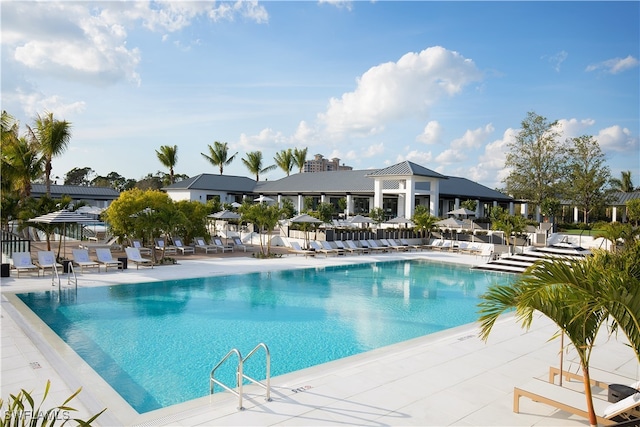 view of swimming pool with a patio area