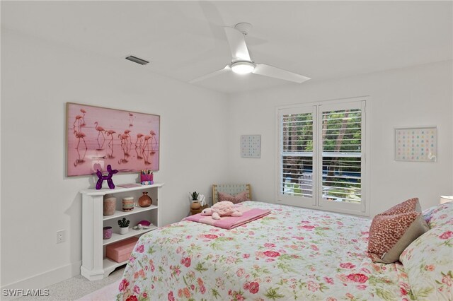 bedroom with ceiling fan and carpet flooring