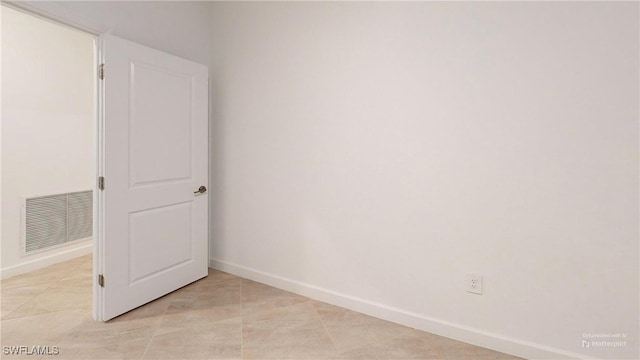 view of tiled spare room