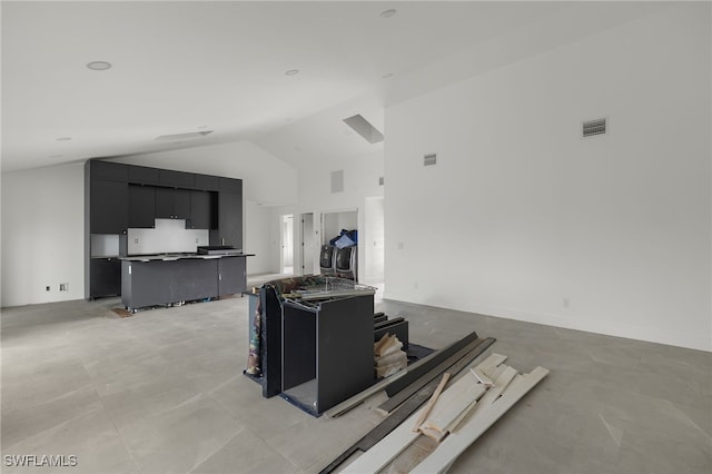 living room with vaulted ceiling