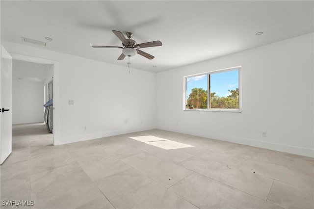 spare room featuring ceiling fan