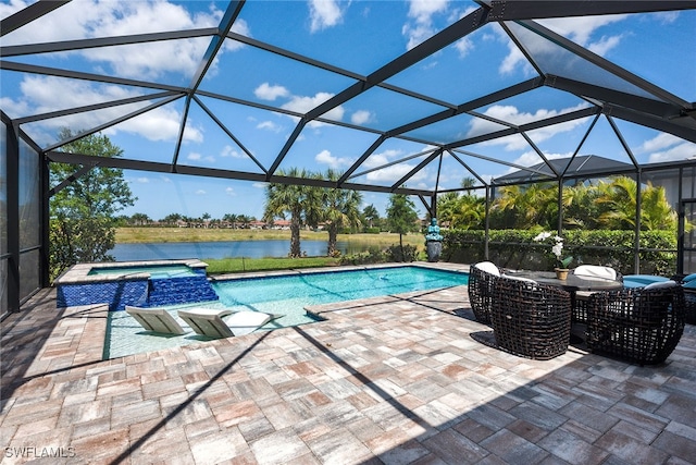 view of pool featuring a water view, an in ground hot tub, a patio area, and glass enclosure