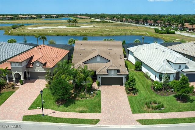 birds eye view of property featuring a water view