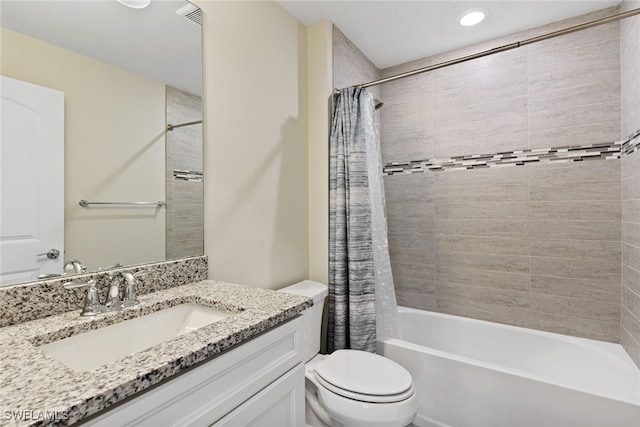 full bathroom with shower / bathtub combination with curtain, vanity, and toilet