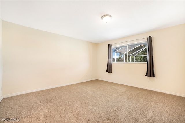 unfurnished room featuring carpet floors