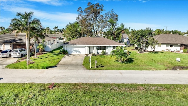 ranch-style home with a garage and a front lawn