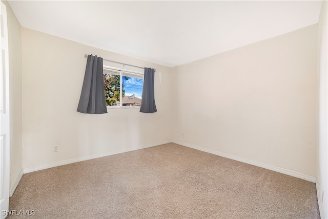 empty room featuring carpet floors