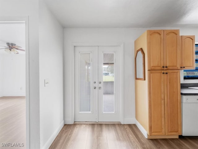 kitchen with french doors, ceiling fan, light brown cabinets, dishwasher, and hardwood / wood-style floors