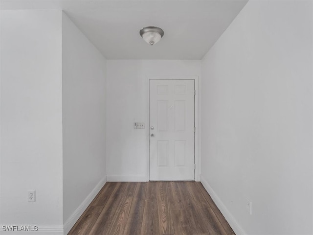 interior space with dark hardwood / wood-style floors