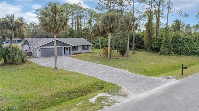 view of front facade featuring a front yard and a garage