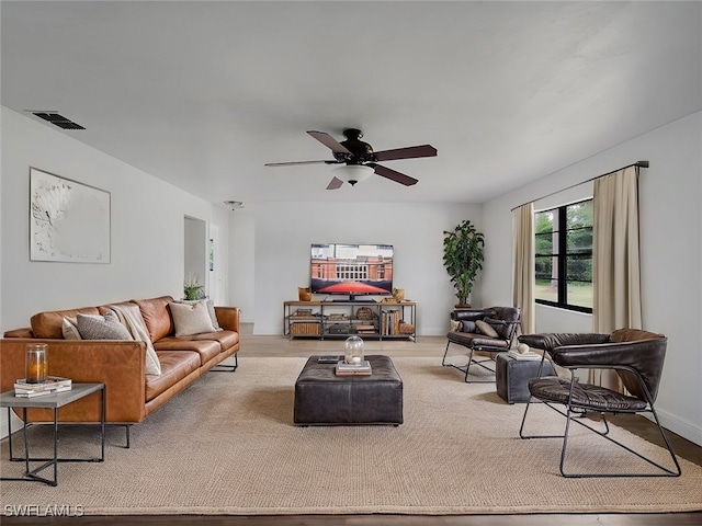 living room with ceiling fan