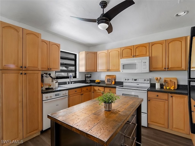 kitchen with ceiling fan, white appliances, sink, and dark wood-type flooring