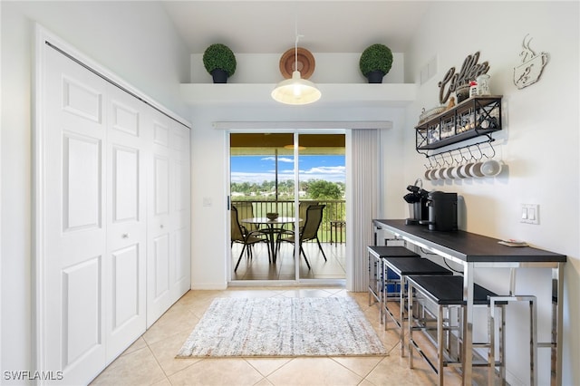 entrance foyer featuring light tile patterned floors